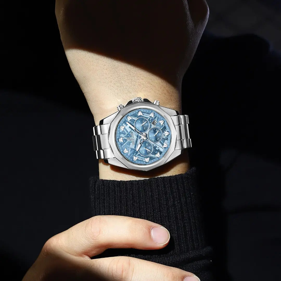 Relógio casual masculino prata com mostrador azul Reward VIP Vanguard no pulso, combinando o brilho sofisticado do mostrador com a pulseira metálica ajustada, ideal para um visual elegante e moderno.