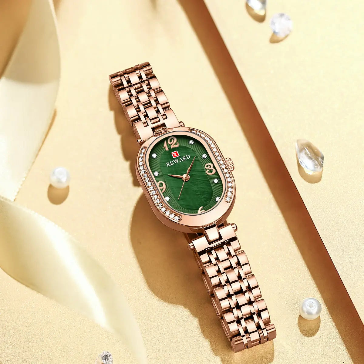 Relógio feminino pequeno rose gold Reward VIP Octávia Mini com mostrador esmeralda visto de cima para baixo