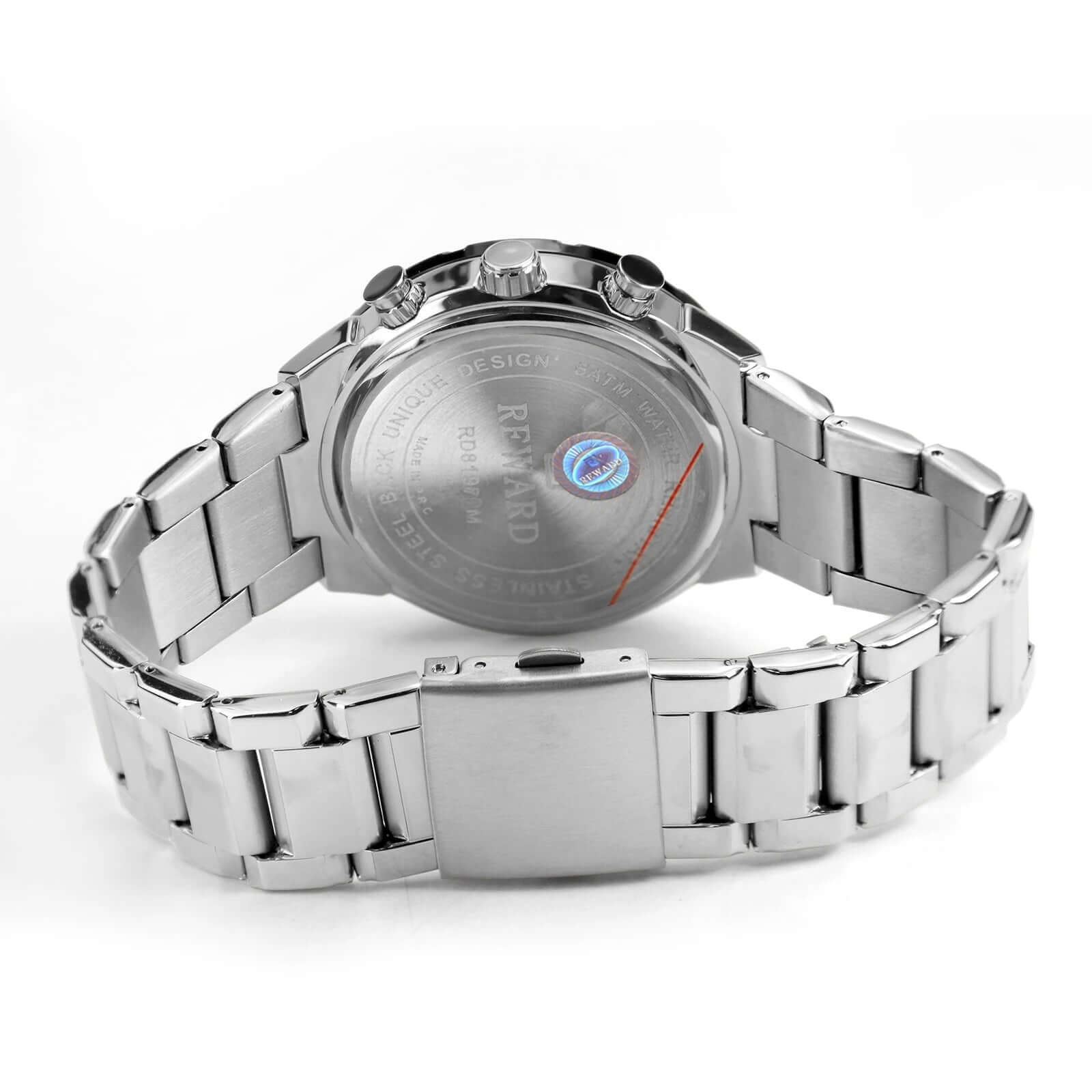 Parte traseira do relógio REWARD VIP Legacy com pulseira de aço inoxidável e fundo em aço escovado com gravações e selo de autenticidade.